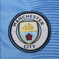Kit Niño Manchester City Titular 2023/2